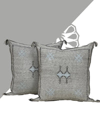 Grey Moroccan pillow in minimalist interior