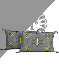 Grey Handwoven Moroccan pillow with colorful Berber patterns