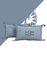 Blue Handwoven Moroccan pillow with colorful Berber patterns
