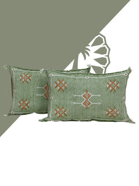 green Handwoven Moroccan pillow with colorful Berber patterns