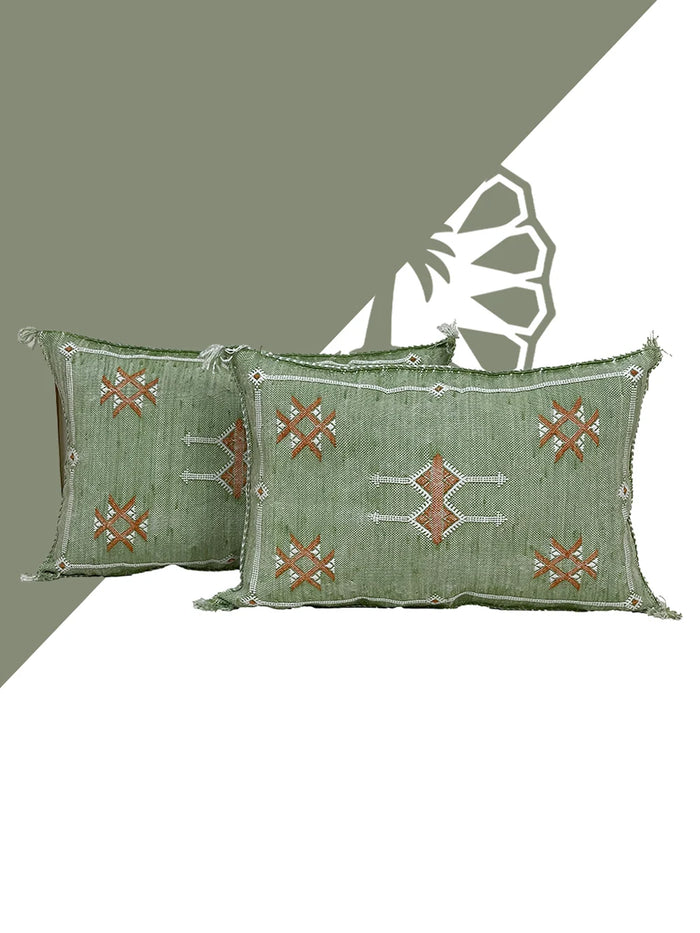 green Handwoven Moroccan pillow with colorful Berber patterns
