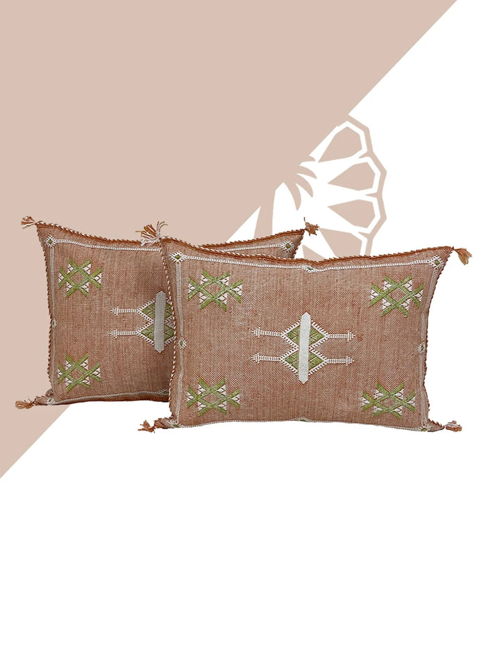 orange Handwoven Moroccan pillow with colorful Berber patterns