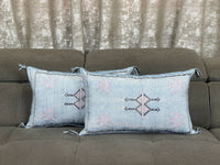 Blue Handwoven Moroccan pillow with colorful Berber patterns