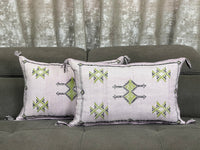 Purple Handwoven Moroccan pillow with colorful Berber patterns