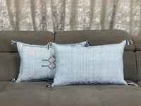 Blue Handwoven Moroccan pillow with colorful Berber patterns