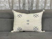 Yellow Handwoven Moroccan pillow with colorful Berber patterns