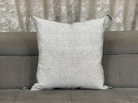 Grey Moroccan pillow in minimalist interior