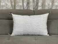 Handwoven Moroccan pillow with colorful Berber patterns
