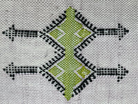 Purple Handwoven Moroccan pillow with colorful Berber patterns