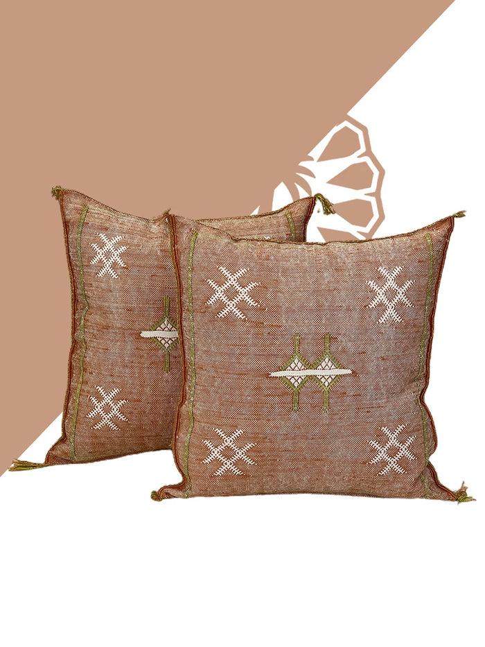 orange Moroccan pillow in minimalist interior