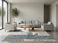 Plush shaggy Moroccan wool rug in a bohemian master bedroom setting, placed partially under a king-size bed with neutral bedding.